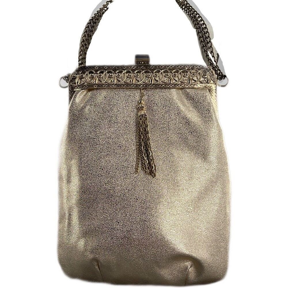 Vintage gold shimmering faux leather glam handbag with tassel.